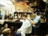 06-higgins-giving-haircut-stan-kramer-far-left-w